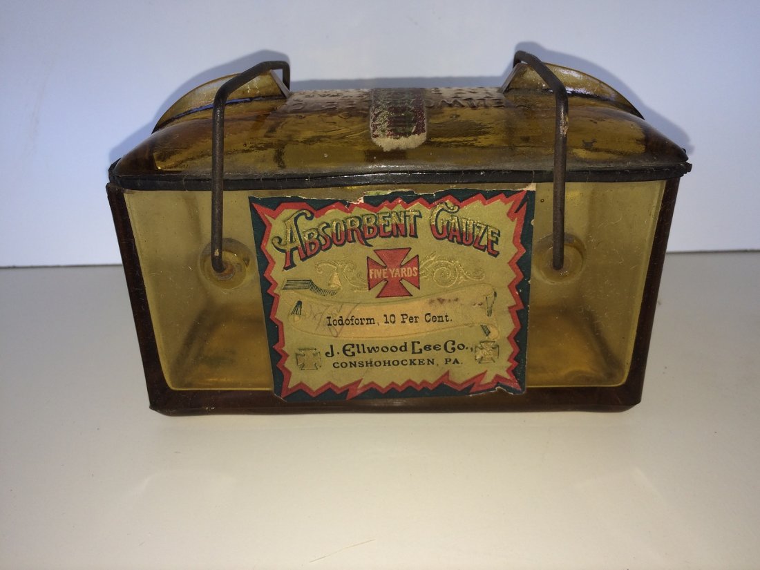 ANTIQUE ABSORBENT GAUZE JAR WITH LID: ANTIQUE ABSORBENT GAUZE JAR WITH LID FROM THE J ELLWOOD LEE CO.CONSHOHOCKEN PA IT MEASURES 5.5 INCHES IN LENGTH AND 3.5 INCHES TALL IT IS GOOD CONDITION FOR ITS AGE SHOW SOME WARE WE OFFER IN HOUSE SH