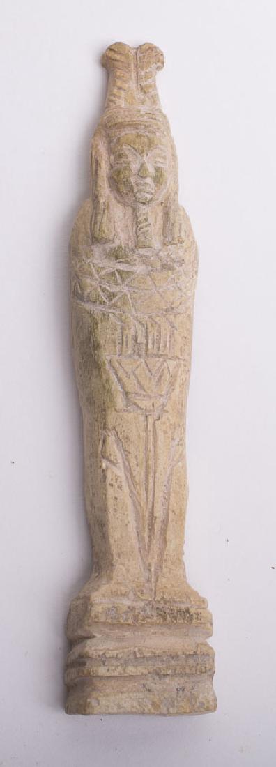 Ancient Roman Egypt Carved Bone figure c.200 AD: Ancient Roman Egypt Carved Bone figure c.200 AD.Size 4 1/4 inches high. Unusual carved bone figure wearing The Crown of Egypt. Condition: perfect. Provenance: Ex Franke Zollman MD Collection.