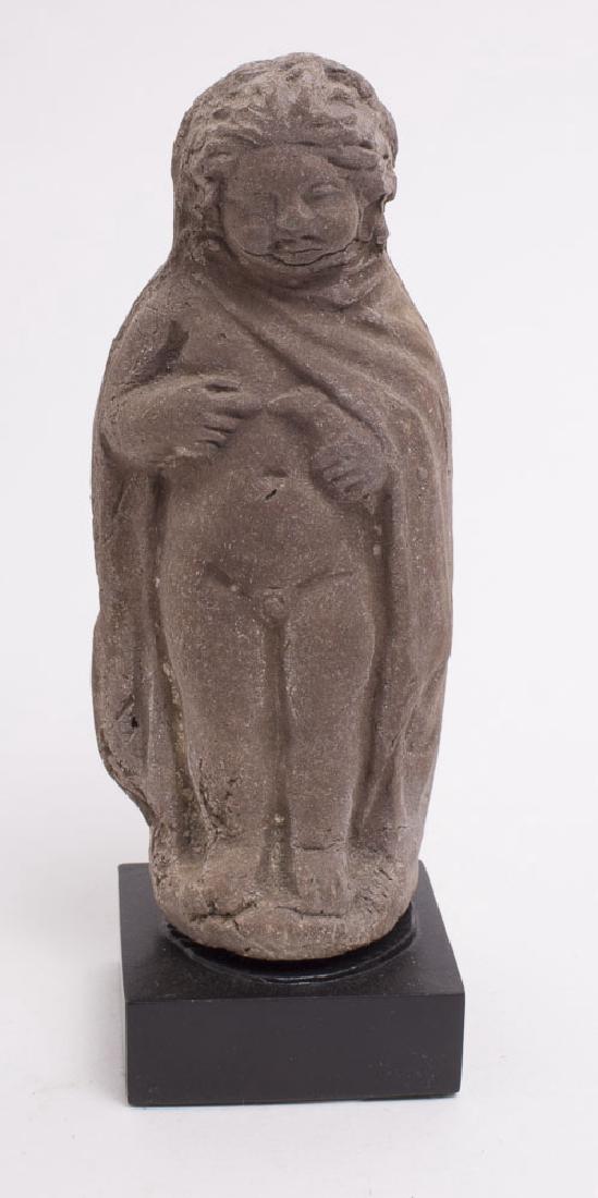 Ancient Roman Egypt Terracotta Figure of a Boy c.2nd ce: Ancient Roman Egypt Terracotta Figure of a Boy c.2nd century AD. Size of the figure 3 7/8 inches high. Fine Hollow Terracotta Figure of a Boy holding a bird in his left hand. custom mounted. Condition
