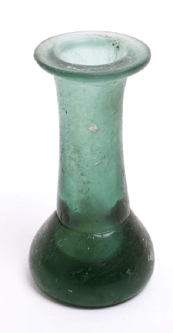 Ancient Roman Glass Jar c.1st-2nd century AD: Ancient Roman Glass Jar c.1st-2nd century AD. Size 3 1/8 inches high. Thick walled dark green jade color jar. Condition: perfect. Provenance: from the estate of Robert Thompson of Philadelphia, Pennsy