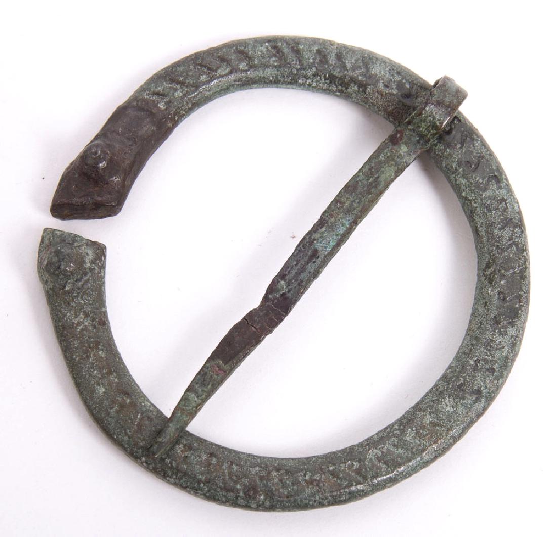 Ancient Roman Bronze Febula c.1st-4th century AD: Ancient Roman Bronze Febula c.1st-4th century AD. Size 2 1/4 inches Diameter. Fine bronze Febula Brooch with original pin. Condition: perfect. Provenance: from the estate of Robert Thompson of Philade