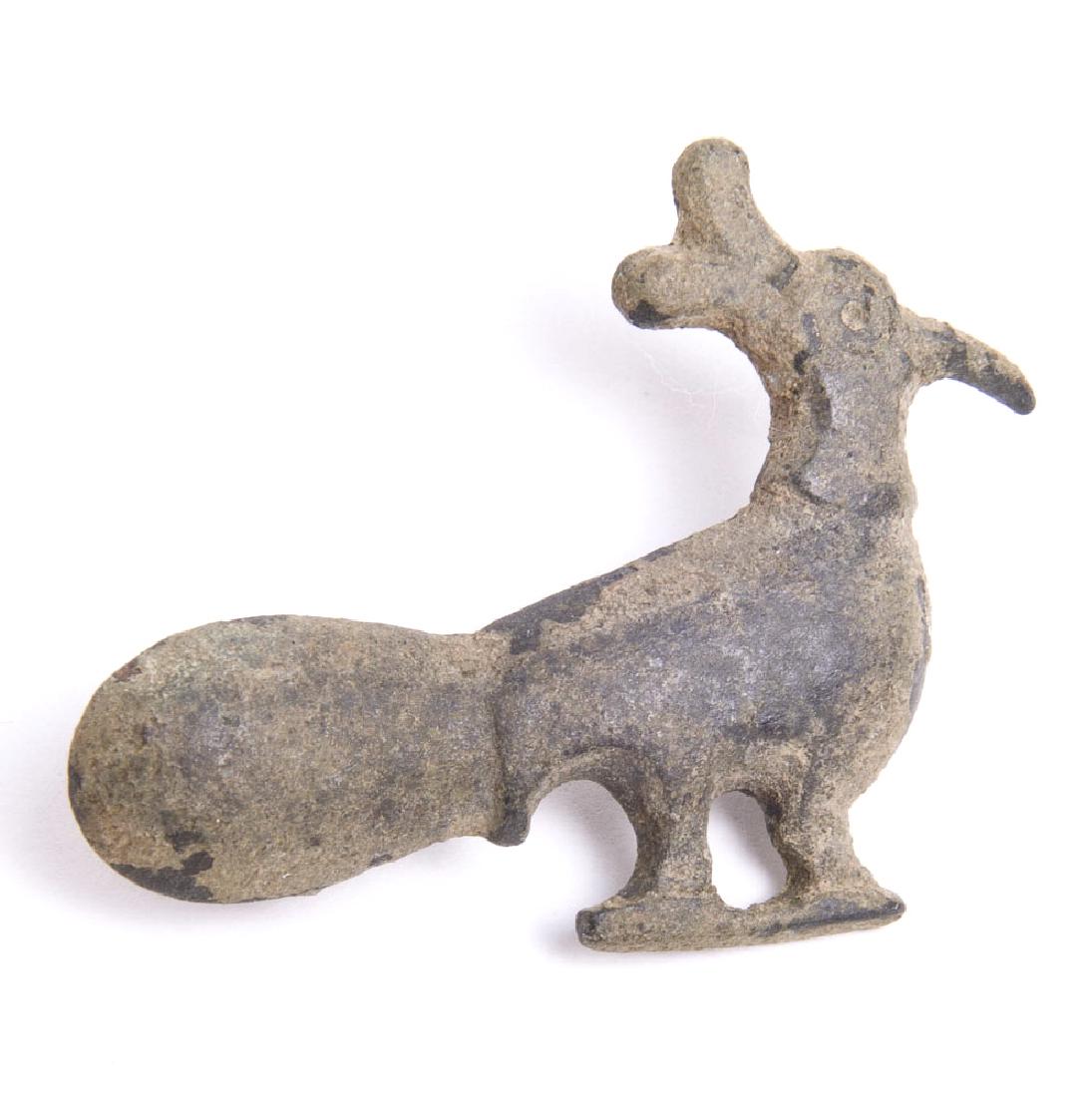 Ancient Islamic Peacock Bronze Brooch c.8th century AD: Ancient Islamic Peacock Bronze Brooch c.8th century AD. Size 2 inches length. Unusual Ancient Islamic Bronze Peacock Febula Brooch. Condition:Missing pin otherwise perfect. Provenance: from the estate