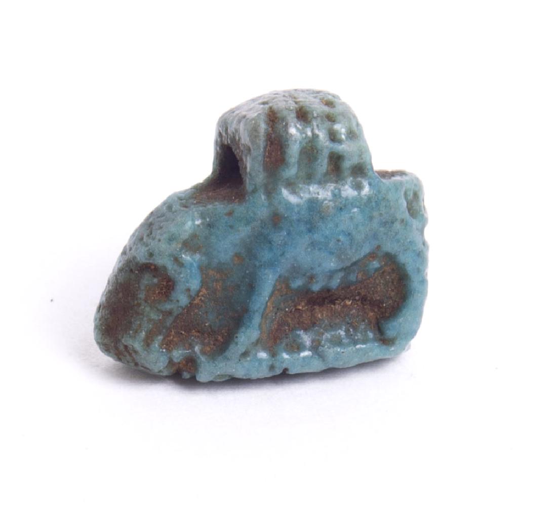 Ancient Egyptian Faience Sow amulet c.300-30 BC: Ancient Egyptian Faience Sow amulet c.300-30 BC. Size 14 mm. Egyptian blue glazed faience Sow Amulet. Condition: perfect. Provenance: from the estate of Robert Thompson of Philadelphia, Pennsylvania.