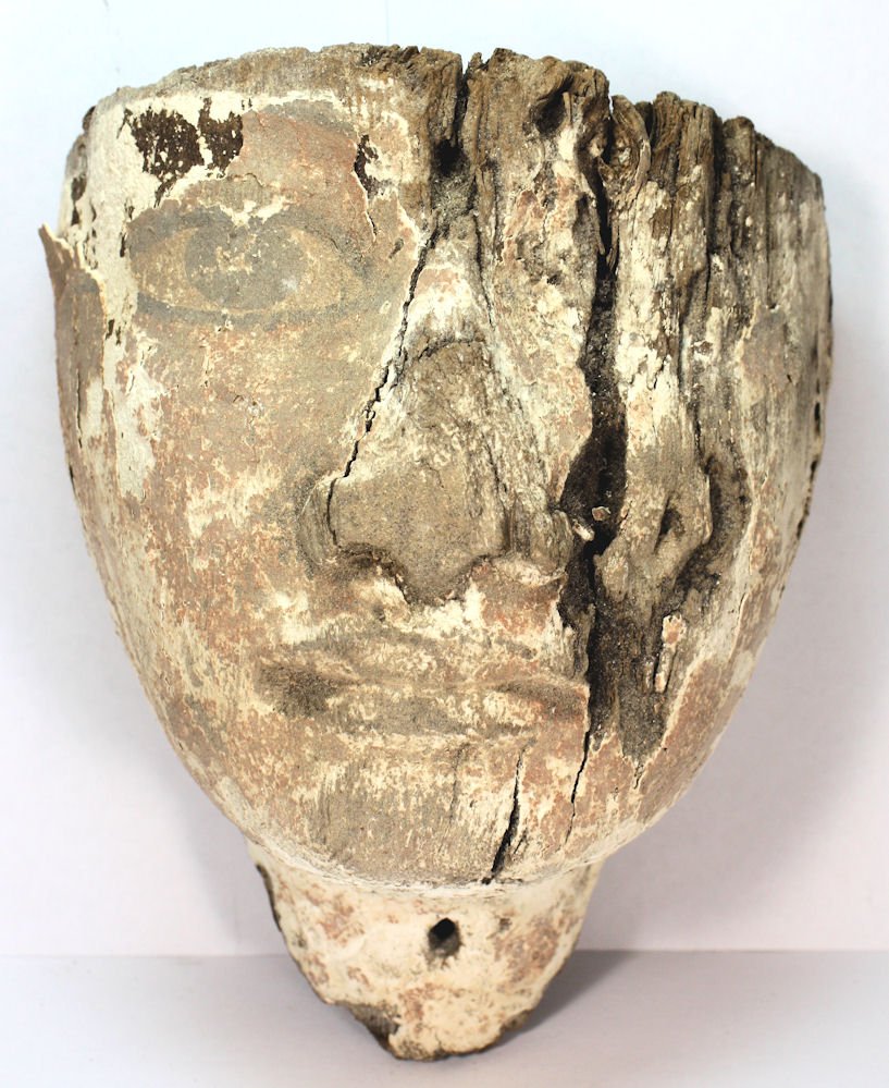 Ancient Egyptian Mummy Wood Mask c.635 BC: Ancient Egyptian Mummy Wood Mask c.635 BC. Size 6 inches high x 4 3/4 inches wide. Ancient Egyptian carved wood Mask painted over gesso. Condition:ancient losses and chips otherwise in good condition.