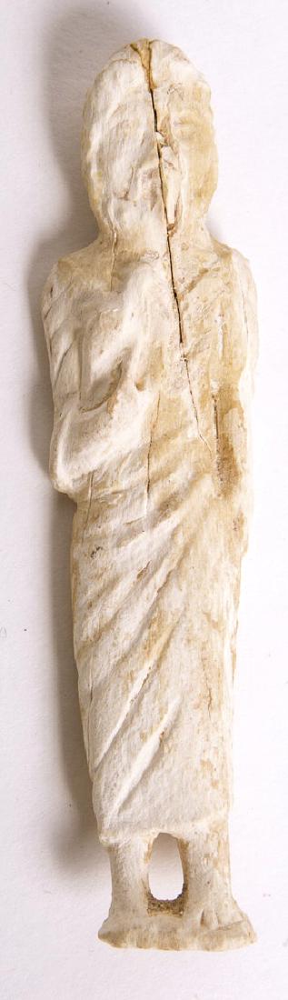 Ancient Roman Bone figure c.1st-2nd century AD.: Ancient Roman Bone figure c.1st-2nd century AD. Size 3 1/4 inches high. Unusual carved bone figure of bearded man. Condition: natural ancient cracks. Provenance: from the estate of Robert Thompson of