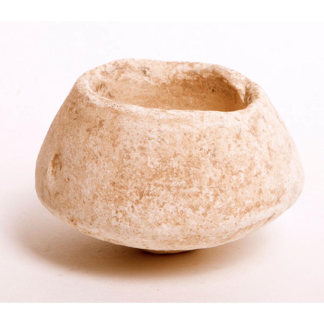 Ancient Mesopotamian Stone Bowl c.600 BC.: Ancient Mesopotamian Stone Bowl c.600 BC. Size 1 1/2 inches high x 2 1/4 inches Diameter.CONDITION: Old chips and ware. Provenance: Ex The Time Machine New York City. acquired from a private USA colle