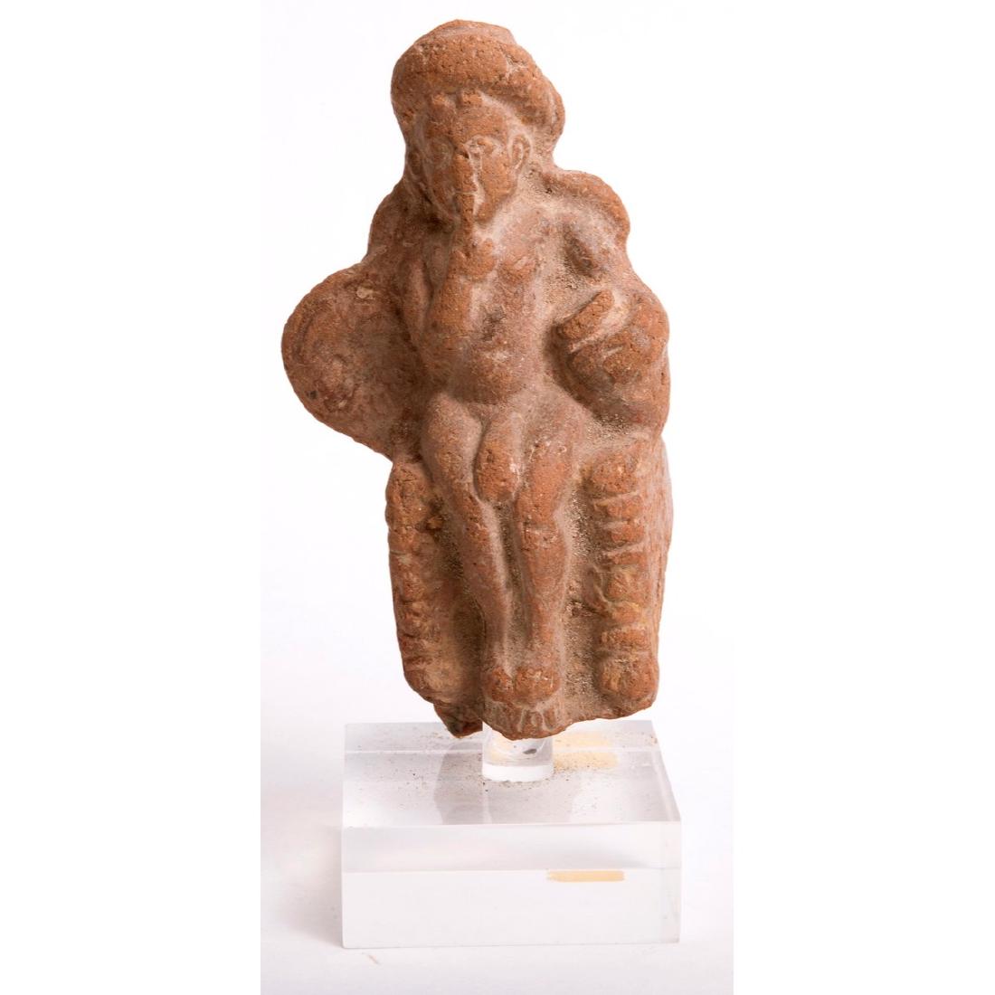Ancient Roman Egypt Erotic Figure c.1st-2nd century AD: Ancient Roman Egypt Erotic Figure c.1st-2nd century AD. Size of figure 4 1/2 inches high. Rare Hollow Terracotta Seated Erotic winged figure. Condition: ancient losses to the sides otherwise perfect. 