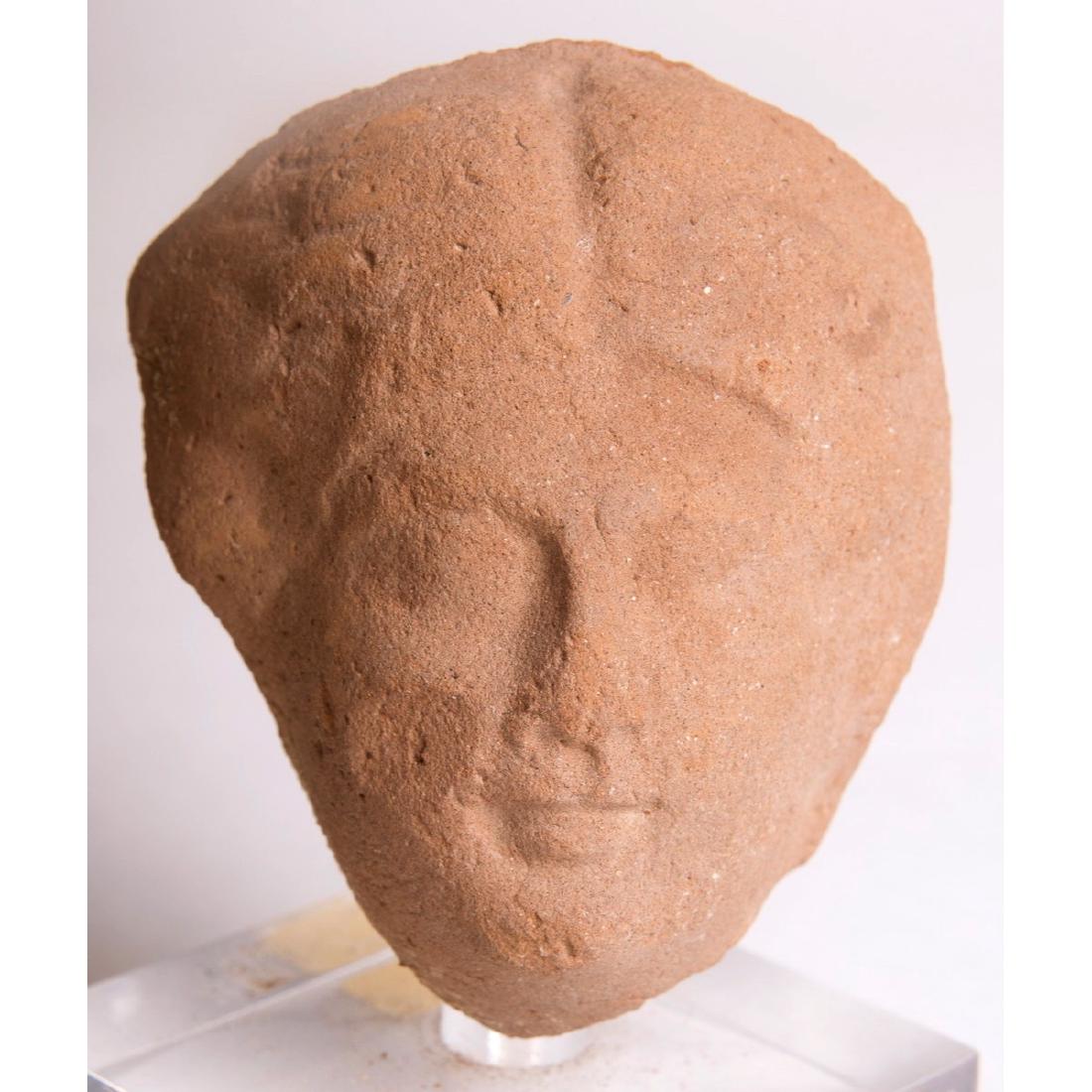 Ancient Roman Egypt Terracotta Face c.1st-2nd cent AD: Ancient Roman Egypt Terracotta Face c.1st-2nd cent AD. Size of face 2 5/8 inches high. A Hollow Terracotta Face Fragment from a figure. Condition: ancient losses to the sides otherwise perfect. Proven