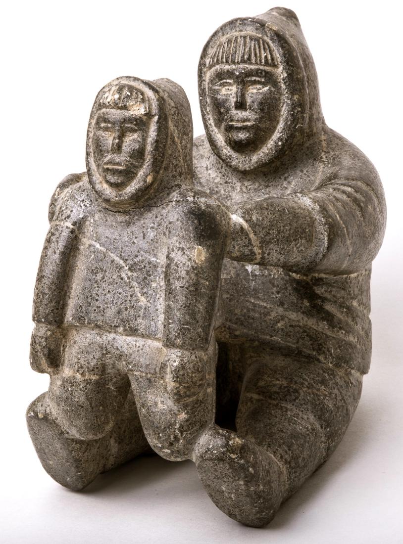Inuit Soapstone Sculpture of a Hunter and Child.: Inuit Soapstone Sculpture of a Hunter and Child. Size 7 3/8 inches length, 7 inches high. Good Age, Ex NY Dr. Collection.Inuit communities are found in the Arctic, in the Northwest Territories, Labrad