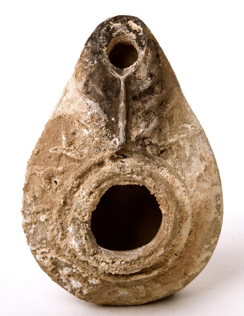 Ancient Byzantine Terracotta Oil Lamp with inscriptions: Ancient Byzantine Terracotta Oil Lamp with inscriptions c.5th-6th century AD. size 4 1/8 inches length.Rare Terracotta oil lamp with Christian inscriptions- This inscriptions may be idealized but in i