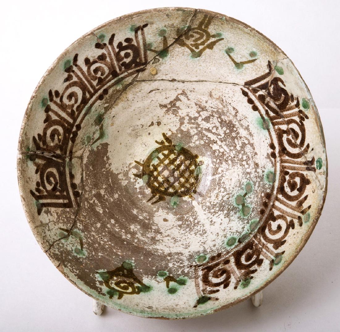 Ancient Islamic 13th C. Persian Ceramic Bowl with Kufic: Ancient Islamic 13th C. Persian Ceramic Bowl with Kufic. Size 6 5/8 inches diameter, 2 3/4 inches high. From the ancient Near East, Iran, ca 12th to 14th century CE. Attractive pottery bowl decorated 