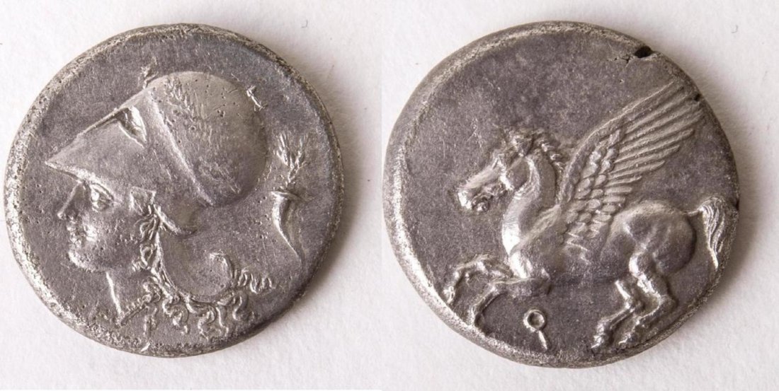 Ancient CORINTHIA, Corinth. Circa 345-307 BC. AR Stater: Ancient CORINTHIA, Corinth. Circa 345-307 BC. AR Stater (21mm, 8.29 gm). Pegasos flying left; koppa below / Head of Athena left, wearing Corinthian helmet decorated with laurel wreath; A-P flanking ne