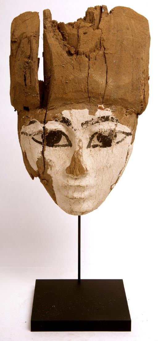 Ancient Egyptian Mummy Wood Mask c.664-332 BC.: Ancient Egyptian Mummy Wood Mask c.664-332 BC. Size 8 1/2 inches high x 5 1/2 inches wide + mount. Fine Ancient Egyptian Mummy Wood Mask painted in white and black over gesso. Condition: cracks, paint