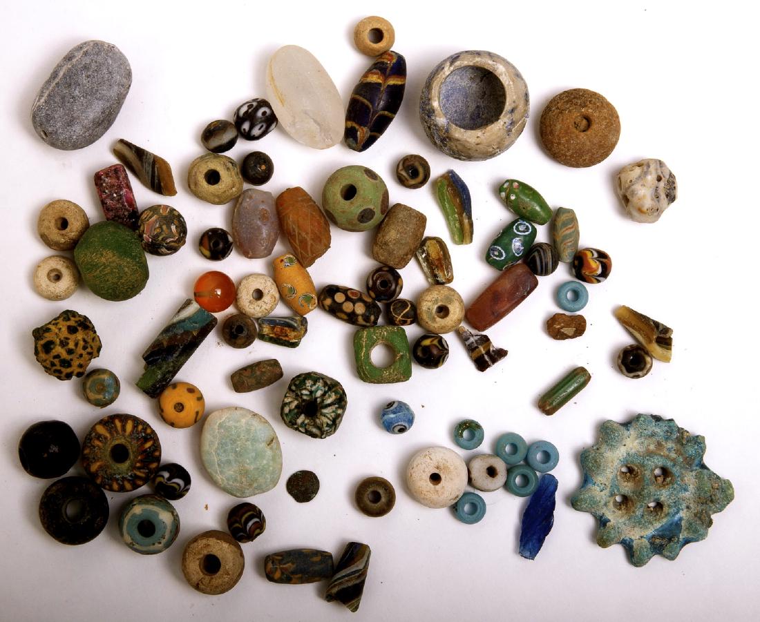 Lot of 70+ Ancient Roman through Islamic Glass Beads: Lot of 70+ Ancient Roman through Islamic Glass Beads c.1st century BC through Islamic period 8th century and later. size 9-46 mm. Great collection of mixed Stone, glass, and ceramic beads. Provenance: