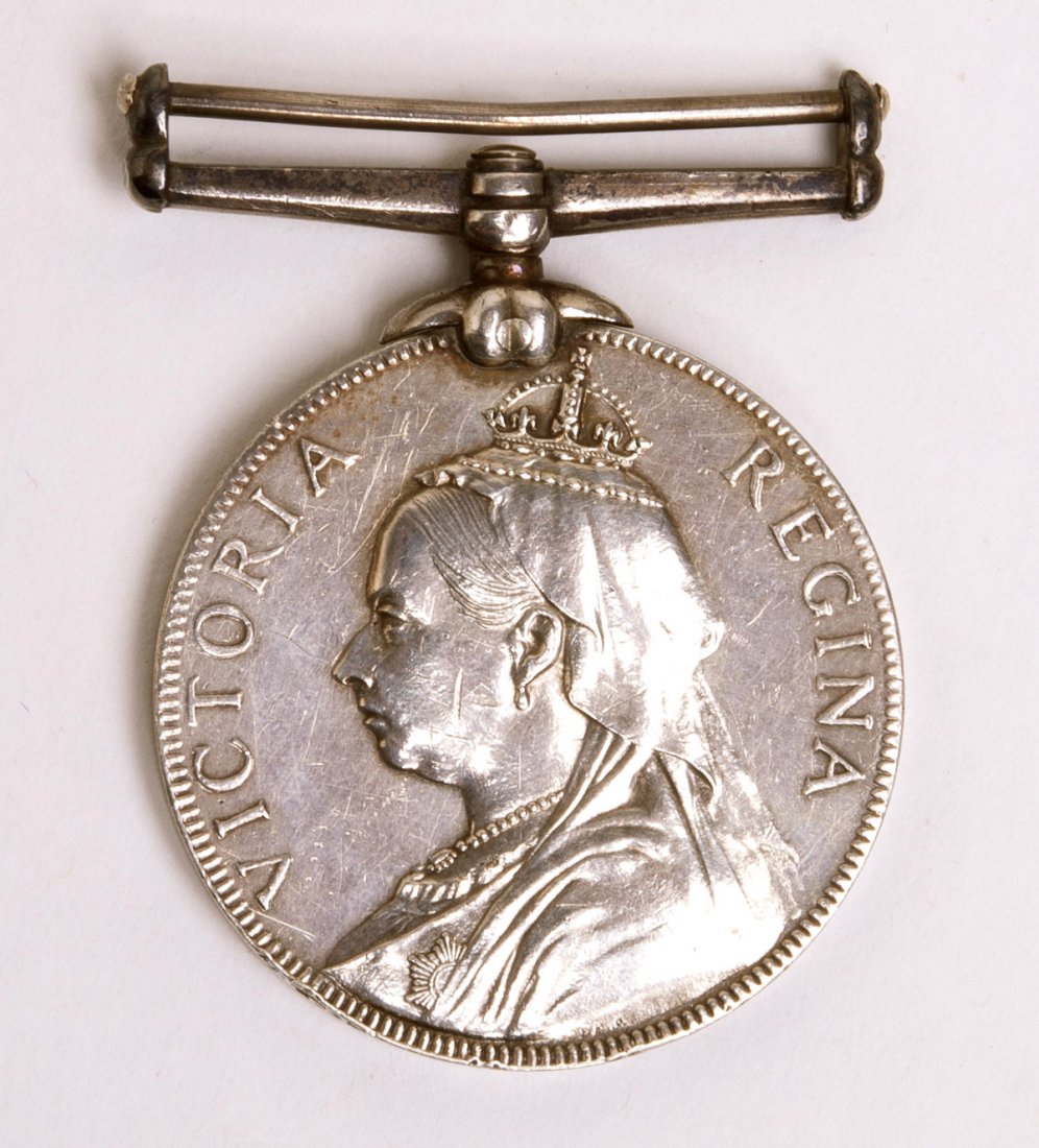 Great Britain Victoria Volunteer Long Service AR Medal: Great Britain Victoria Volunteer Long Service AR Silver Medal. 1894. Older bust of Victoria left?reverse Script within wreath. Size 36 mm diameter x 3 mm thickness. weight 34.3 grams. VF.