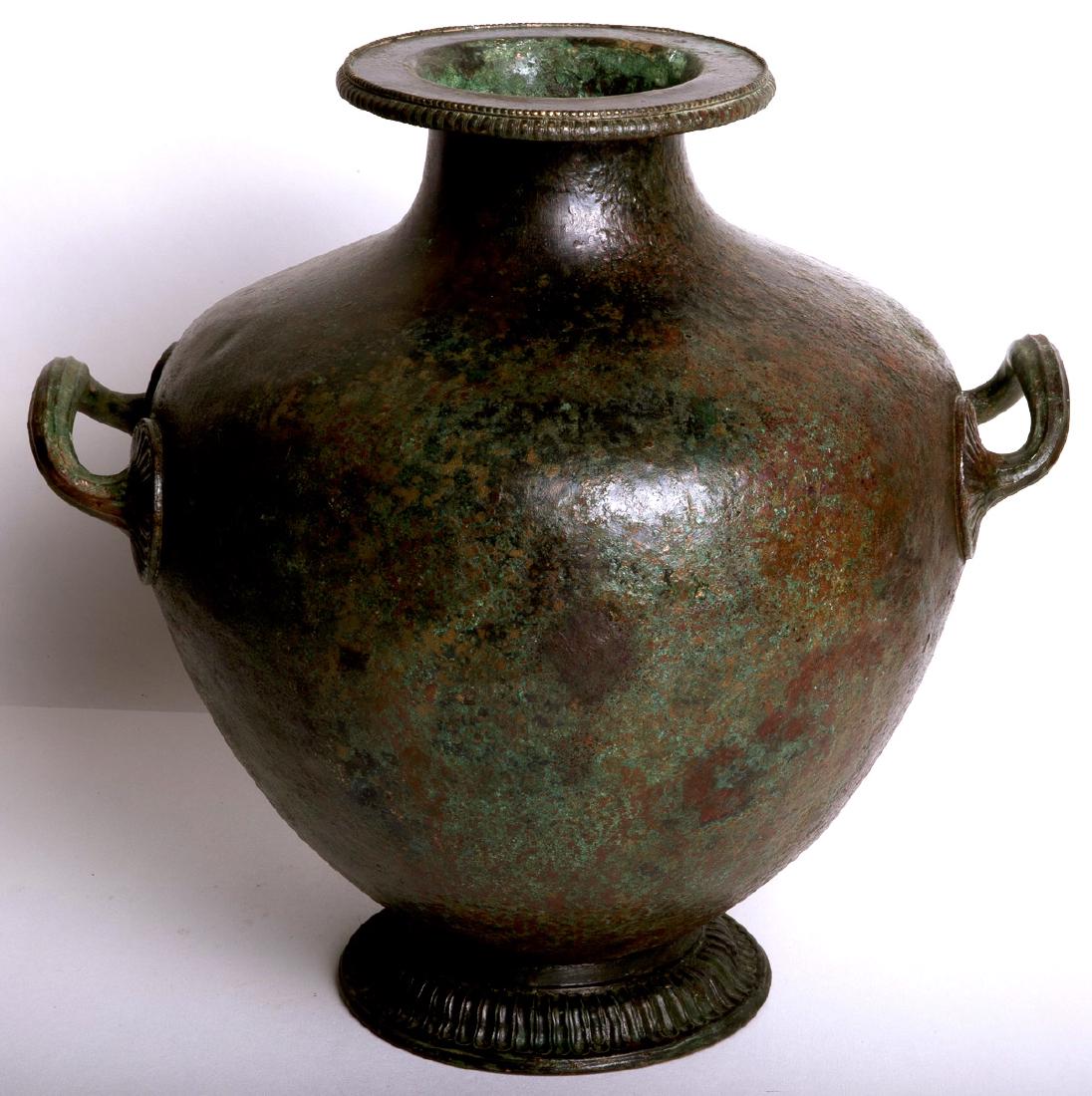 Ancient Greek Bronze Amphora Bulbous bronze wine vessel: Ancient Greek Bronze Amphora Bulbous bronze wine vessel Circa 5th century BCE.used by the elite ruling class of society. Decorated withegg and dart motif at foot and handles. Size 12-1/4 inches (31.1c