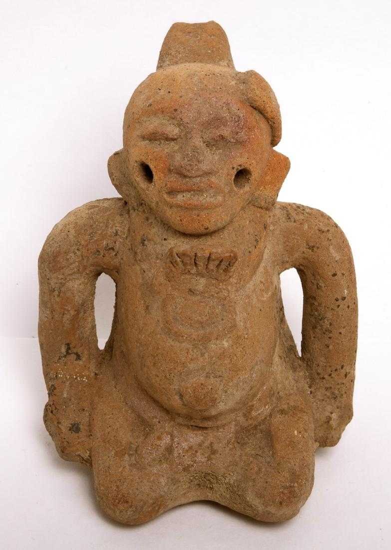 Ancient Pre Columbian Mayan Molded Dwarf, Provincial: Ancient Pre Columbian Mayan Molded Dwarf, Provincial regions circa 600 to 900 AD. Size 4 1/2 inches high. Fashioned with earspools. Kneeling with hands to lap. Good Orange color. Ex Miami Beach Collec