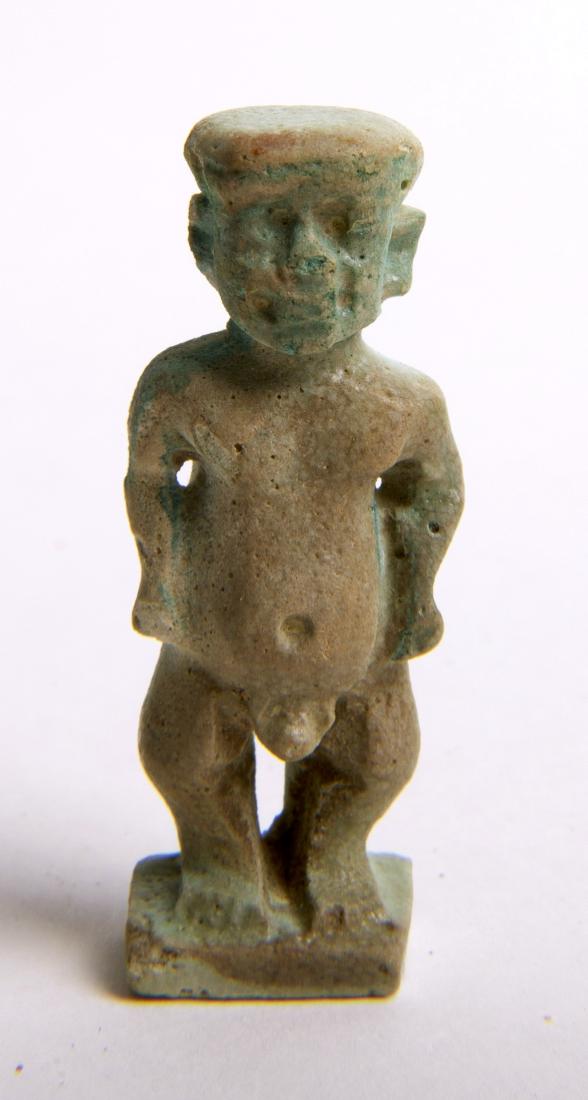 Ancient Egyptian Faience Amulet of Patiakos c.700-30 BC: Ancient Egyptian Faience Amulet of Patiakos c.700-30 BC. Size 1 5/8 inches high. Fine Green Faience amulet of Patiakos. great details. Condition: Minor wear otherwise perfect. Provenance: Ex Private N