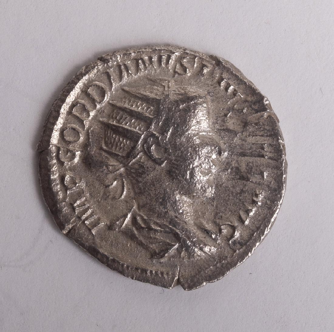 Ancient Roman Silver Antoninianus Gordian III. A.D. 238: Ancient Roman Silver Antoninianus Gordian III. A.D. 238-244. AR antoninianus. 3.61 gm. 22 mm. Rome mint. A.D. 242. His radiate, draped, and cuirassed bust right; IMP GORDIANVS PIVS FEL AVG / Gordian s