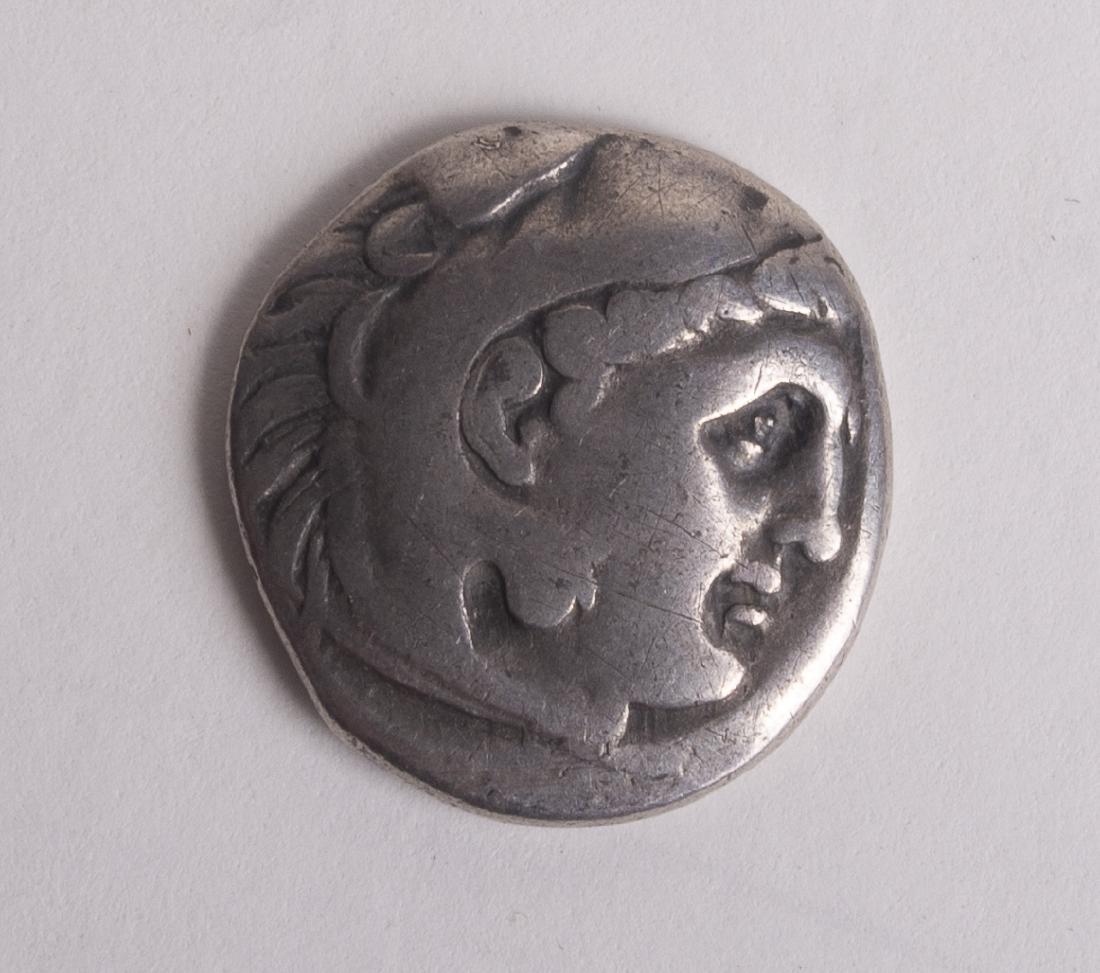 Ancient Macedon, Kings of. Alexander III. 336-323 BC.: Ancient Macedon, Kings of. Alexander III. 336-323 BC. AR (silver) Drachm (17 mm, 4.04 gm). Head of Herakles right, wearing lion skin headdress / ALEXANDRO[U], Zeus seated left, holding eagle and scept