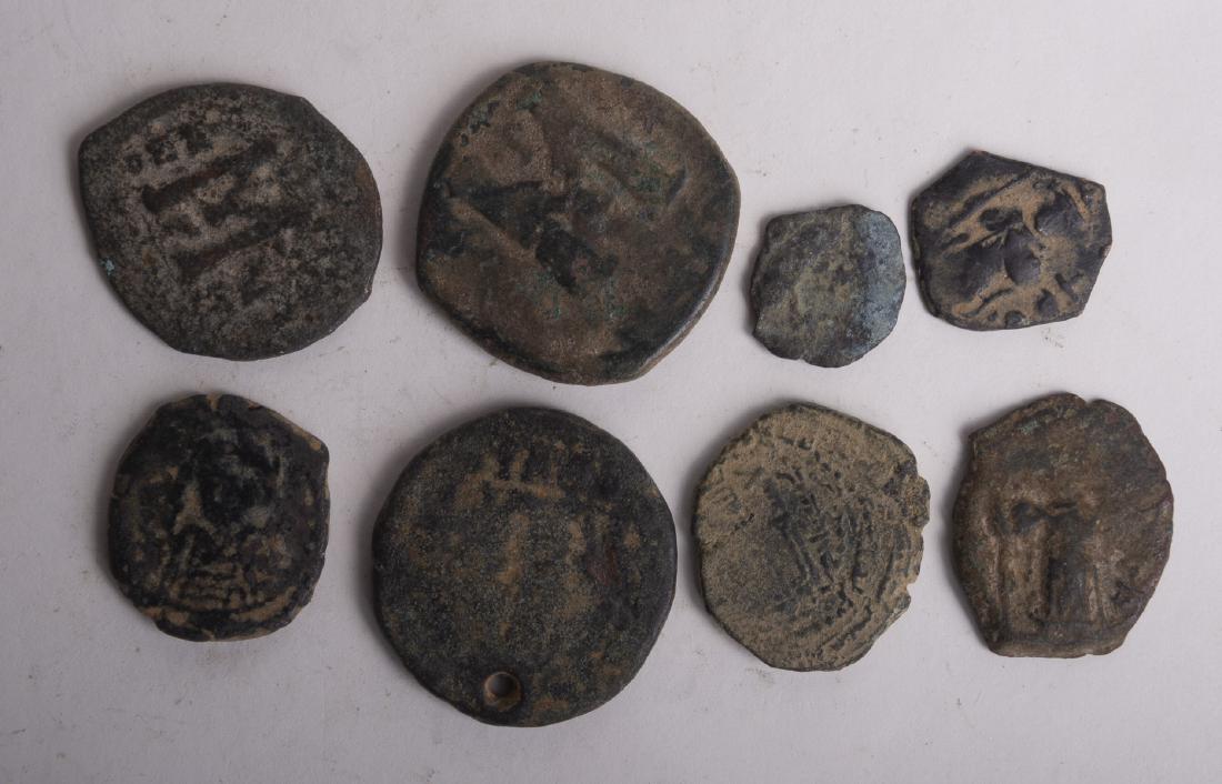 Lot of 8 Ancient Byzantine Empire Bronze Coins: Lot of 8 Ancient Byzantine Empire Bronze Coins. Size 29-16 mm. a nice lot of Ancient uncleaned Byzantine Bronze coins. great lot for research and study.