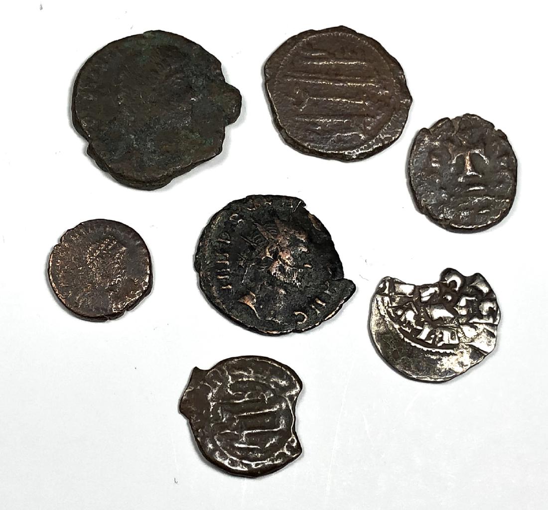 Lot of 7 Ancient Roman, Islamic, Medieval, Bronze Coins: Lot of 7 Ancient Roman, Islamic, Medieval Bronze Coins etc... Size 20-11 mm. a nice lot of Ancient Silver and bronze coins, Roman and islamic coins. great lot for research and study.