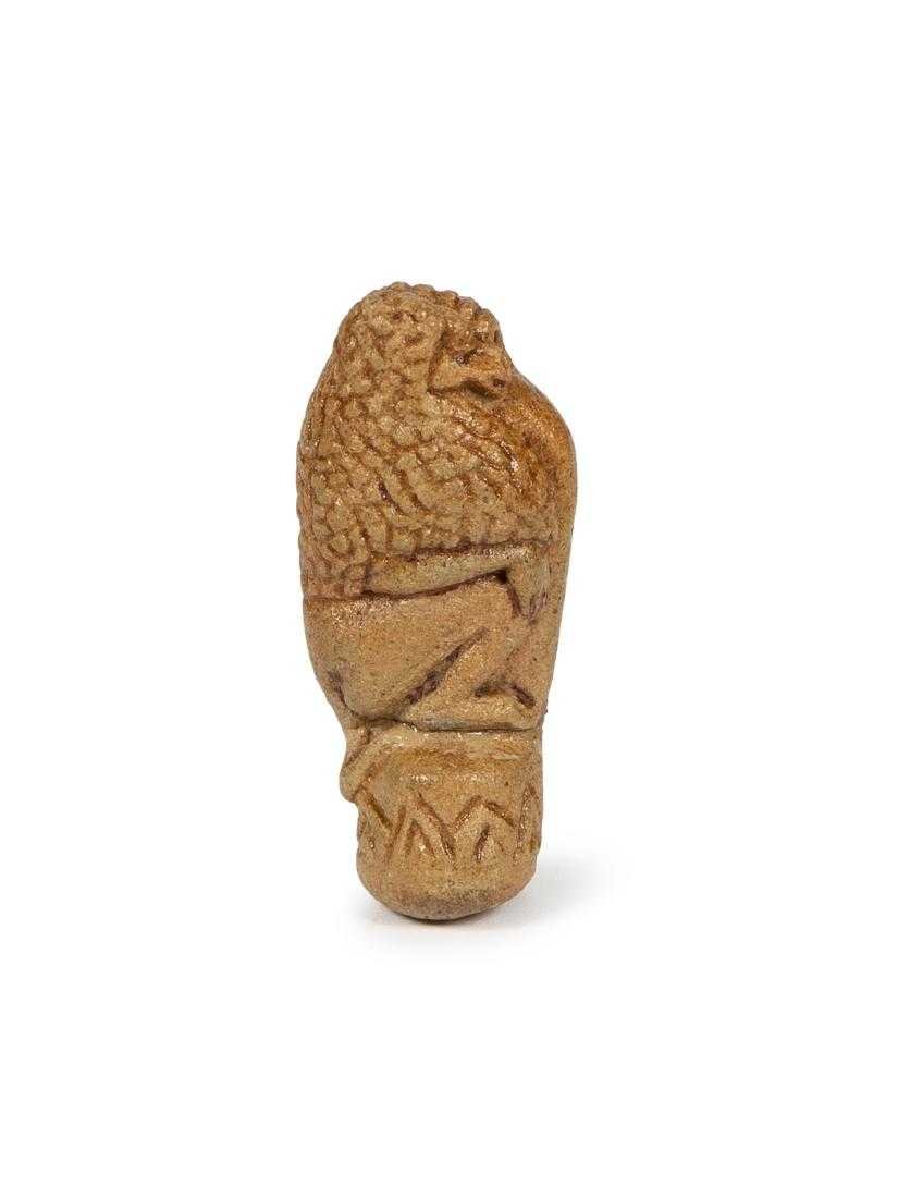Ancient Egyptian Faience Baboon Amulet c.715-300 BC: Ancient Egyptian Faience Baboon Amulet c.715-300 BC. Size 2 1/4 inches high. Fine Ancient Egyptian green faience amulet of Baboon reclining facing right seated on lotus flower base. Condition: repaire