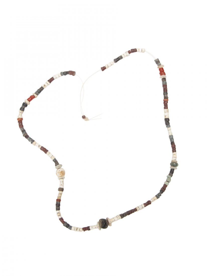 Ancient Tyre, Sidon, Byblos black and white stone beads: Ancient Tyre, Sidon, Byblos black and white stone beads c.4th century BC. Size 22 mm. Hard stone beads necklace from Ancient Tyre. Perfect. Ex Franke Zollman USA.