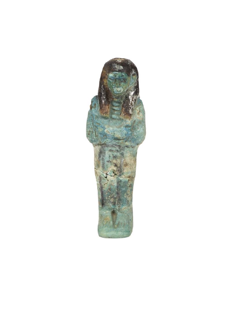 Ancient EGYPTIAN Faience Ushabti With Heiroglyph: Ancient EGYPTIAN Faience Ushabti With Heiroglyph 19th Dynasty, ca. 1069 - 945 BC. Size 4 1/8 inches high. A mummified form blue faience Ushabti figure, with tripartite wig, the arms shown crossed and 