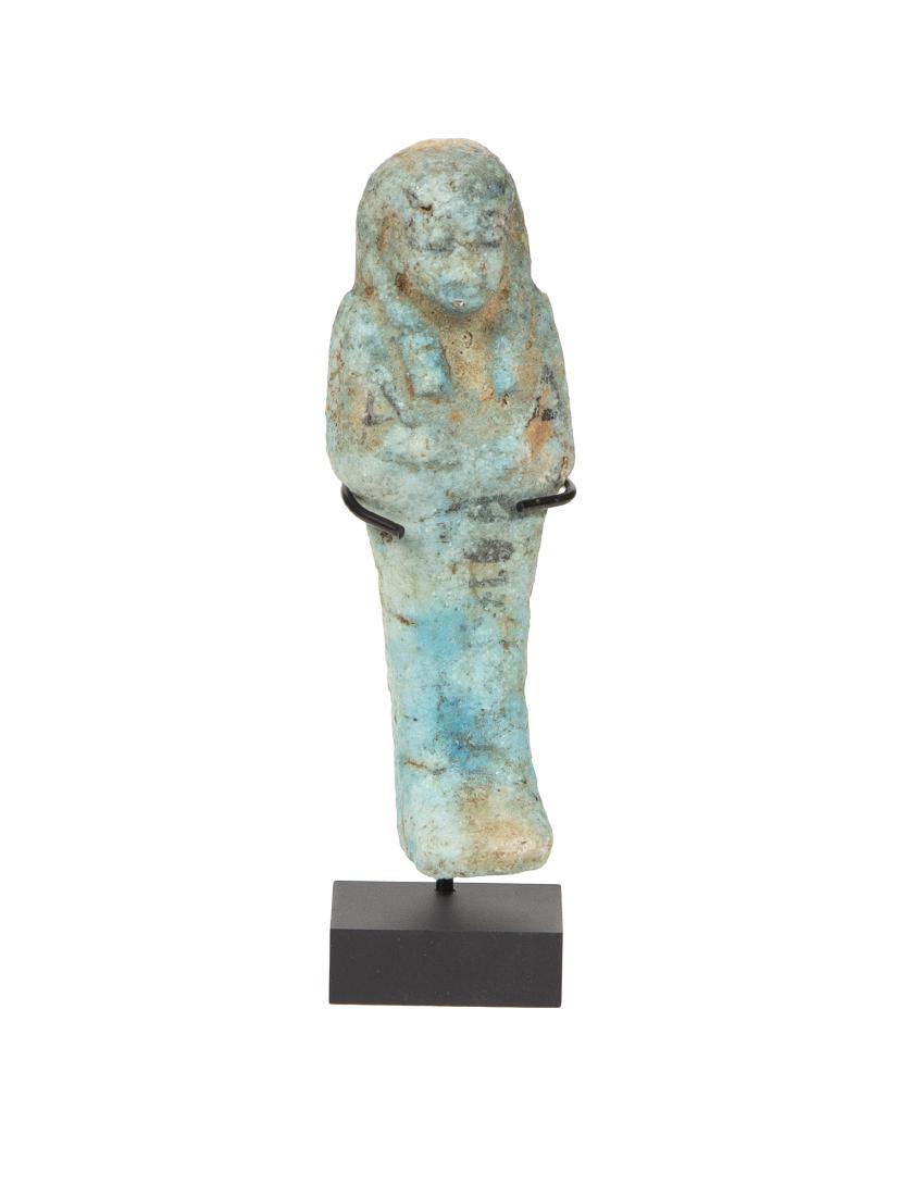 Ancient EGYPTIAN Faience Ushabti With Heiroglyph: Ancient EGYPTIAN Faience Ushabti With Heiroglyph 19th Dynasty, ca. 1069 - 945 BC. Size 4 1/2 inches high. A mummified form blue faience Ushabti figure, with tripartite wig, the arms shown crossed and 