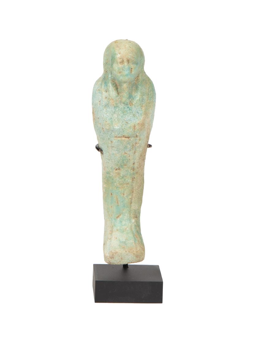 Ancient EGYPTIAN Faience Ushabti With Heiroglyph Late: Ancient EGYPTIAN Faience Ushabti With Heiroglyph Late Period c.664-332 BC BC. Size 4 7/8 inches high. A mummified form blue faience Ushabti figure, with tripartite wig, beard of Osiris, the arms shown