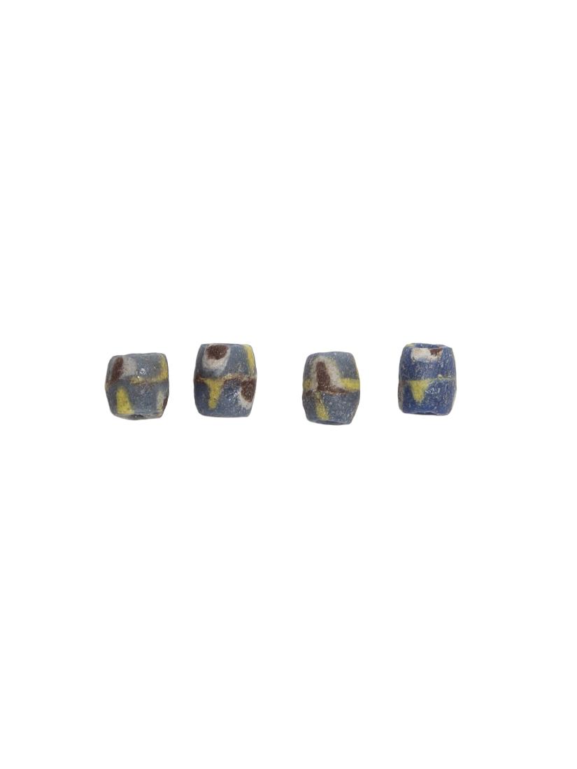 Lot of 4 Ancient Roman Egypt Millifiore Glass beads: Lot of 4 Ancient Roman Egypt Millifiore Glass beads 1st-3rd century A.D. Size: 11 x 9 mm. Fine millifiore paste glass beads depicting a multicolor eye shape design. Intact, exc. cond. A beautiful exam