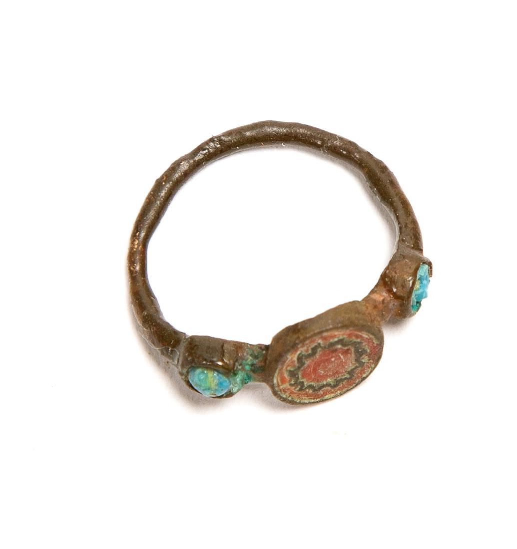 A Medieval Bronze ring with enamel c.11th-12th century: A Medieval Bronze ring with enamel c.11th-12th century AD. Ring Size 3 USA. A Fine example of a medieval ring with a highly decorated red inlay and two turquoise inserts. perfect. ex the time machine.