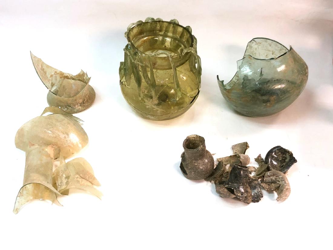 Lot of Ancient Roman, Islamic Glass Shards, Vessels: Lot of Ancient Roman, Islamic Glass Shards, Vessels fragments. c.1st to 10th century AD. Fantastic lot of ancient glass vessels fragments with great iridescent Patina. Great lot for use with jewelry o