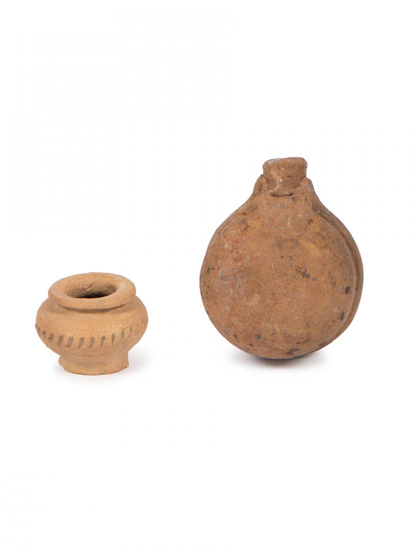 Lot of 2 Ancient Roman Egypt Terracotta Vessels c.1st: Lot of 2 Ancient Roman Egypt Terracotta Vessels c.1st-2nd century AD. Size 1 1/4 to 2 3/4 inches high. Unusual form of a terracotta double flask together with a small vessel. Private NYC collection, b