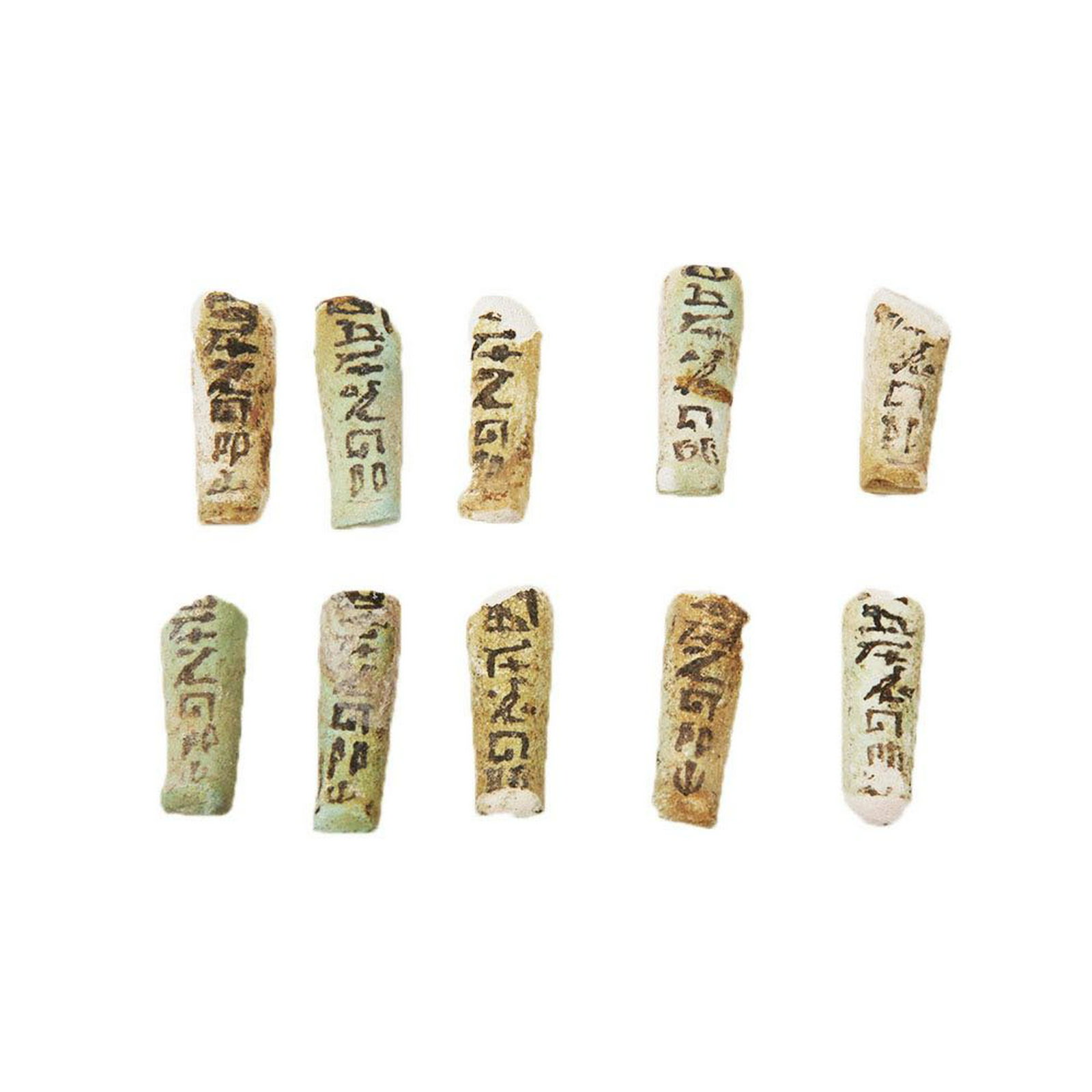 Lot of 10 Ancient EGYPTIAN Faience Ushabti fragments: Lot of 10 Ancient EGYPTIAN Faience Ushabti fragments With Heiroglyph 19th Dynasty, ca. 1069 - 945 BC. Size 1 7/8 - 1 1/2 inches high. A lot of 10 green faience Ushabti fragments, with line of Hierogly