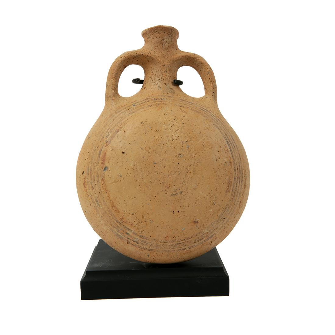 Ancient Holy Land Iron Age Pottery Flask c.1000 BC.: Ancient Holy Land Iron Age Pottery Flask c.1000 BC. Size 6 1/4 inches high x 4 1/2 inches diameter + mount. Fine pottery Flask with twin handles, decorated with brown circle design on both sides. Cond