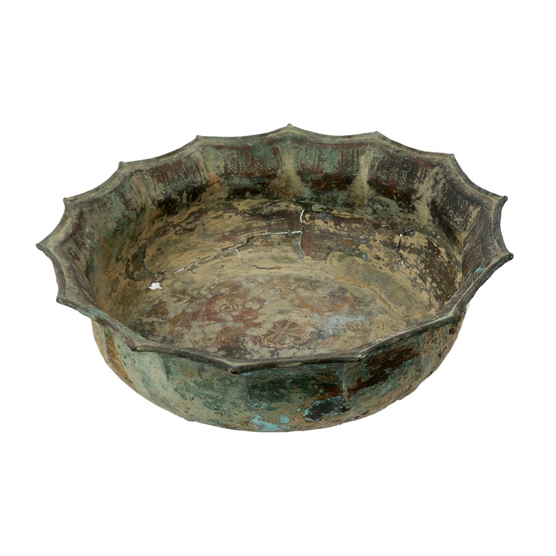Islamic Persian Seljuk Bronze Basin c.9th century AD.: Islamic Persian Seljuk Bronze Basin c.9th century AD. Size 17 1/2 inches diameter. 5 inches high. Fine Ancient Islamic Persian Basin decorated with Arabic Kufic inscription and floral design. Ex New Y