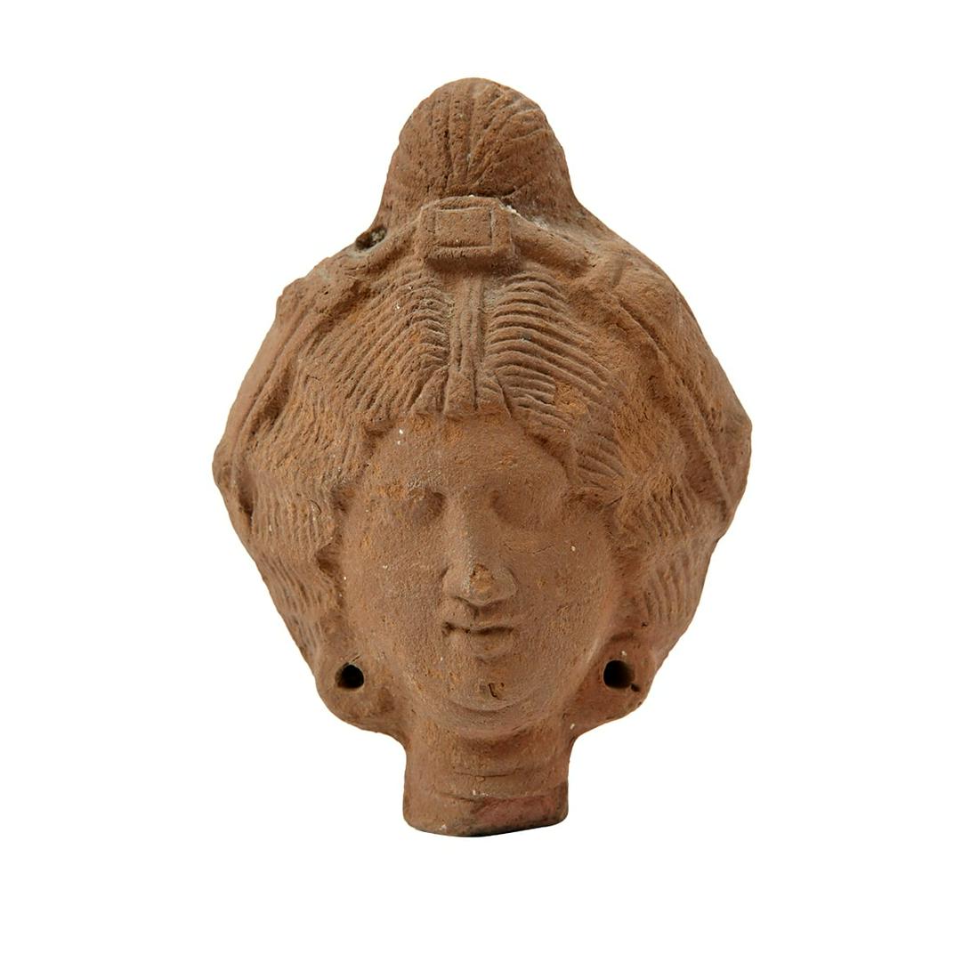 Ancient Hellenistic Terracotta Head c.3rd century BC.: Ancient Hellenistic Terracotta Heads c.3rd century BC. Size 4 1/2 inches high. Fine hollow Terracotta female head fragment from a full statue. Ex John and Jane Stubbs New York City acquired from Sothe
