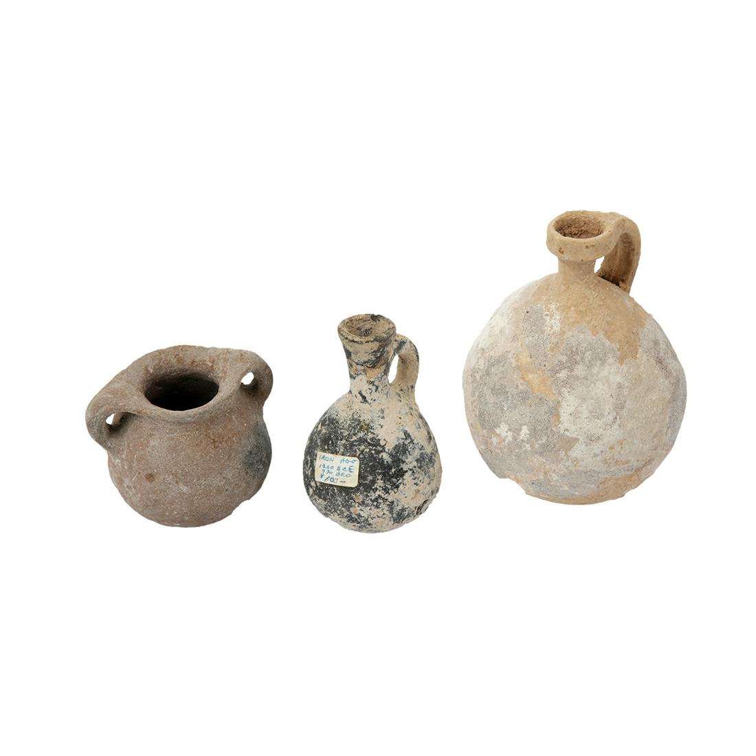 Lot of 3 Ancient Holy land Iron Age Terracotta Vessels: Lot of 3 Ancient Holy land Iron Age Terracotta Vessels c.1000 BC. Size 5 1/4 - 3 inches high. Nice lot of 3 Ancient terracotta vessels from the holy land Iron Age. Ex: Jack P. Minor New York 1950's.