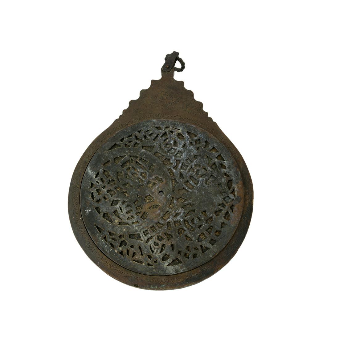 Large Middle Eastern Islamic Copper Astrolabe: Large Middle Eastern Islamic Copper Astrolabe Size 17 inches length x 11 inches diameter. A massive copper Astrolabe with four disks, each decorated with 12 horoscope signs and Arabic calligraphy. Pro