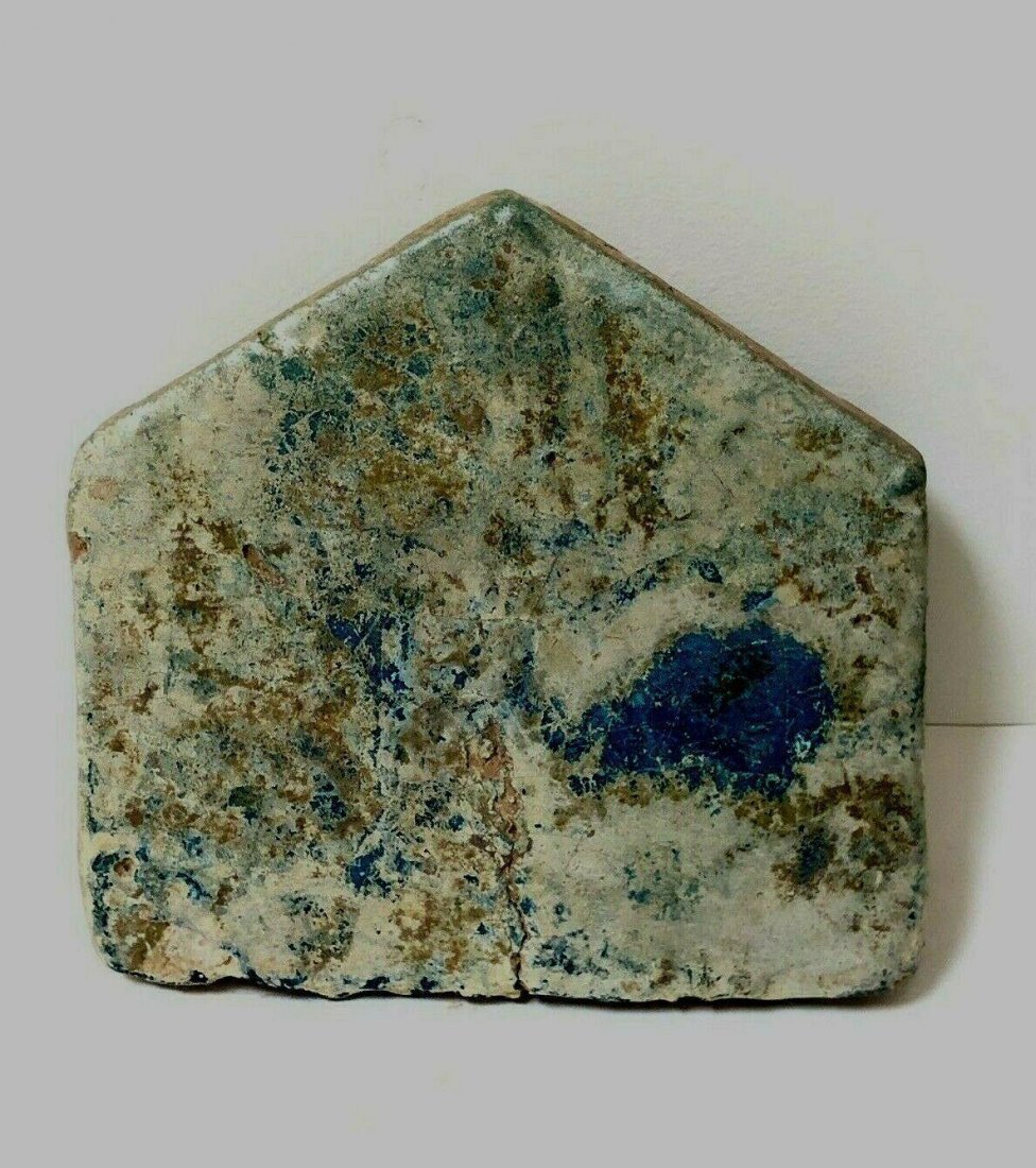 Ancient Islamic Middle Eastern glazed pottery Tile c.14: Ancient Islamic Middle Eastern glazed pottery Tile c.14th century. Size 10 x 9 1/4 inches. A Large Thick ceramic blue glazed ceramic tile. a stable crack otherwise in good condition. Ex Chicago Estate