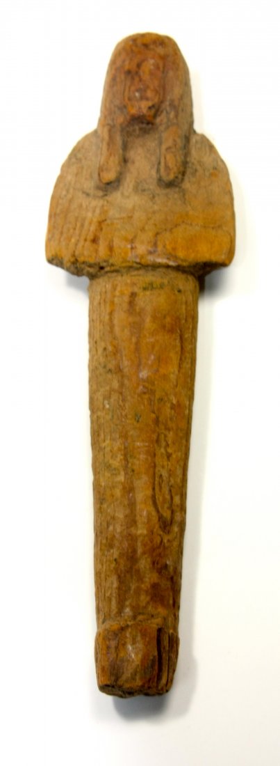 Ancient Egyptian Wood Ushabti Figure c.700 BC.: Ancient Egyptian Wood Ushabti Figure c.700 BC. Size 6 7/8 inches high (17.4 cm). Large carved hardwood ushabti, wearing the royal wig. Provenance:Private NYC collection, brought to USA prior to 1948, 