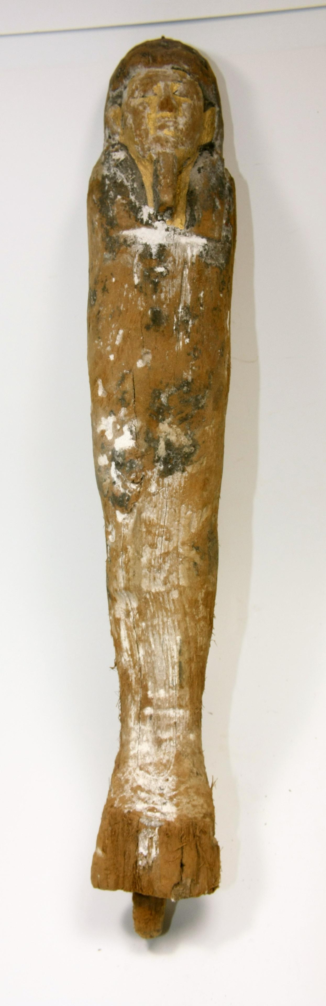 Ancient Egyptian Ptah Sokar Osiris Wood figure: Ancient Egyptian Ptah Sokar Osiris Wood figure c.664-332 BC. Size 15 1/2 inches high. (39.3 cm) A large figure of Ptah Sokar Osiris standing with remaining paint over gesso. The mummiform figure wears