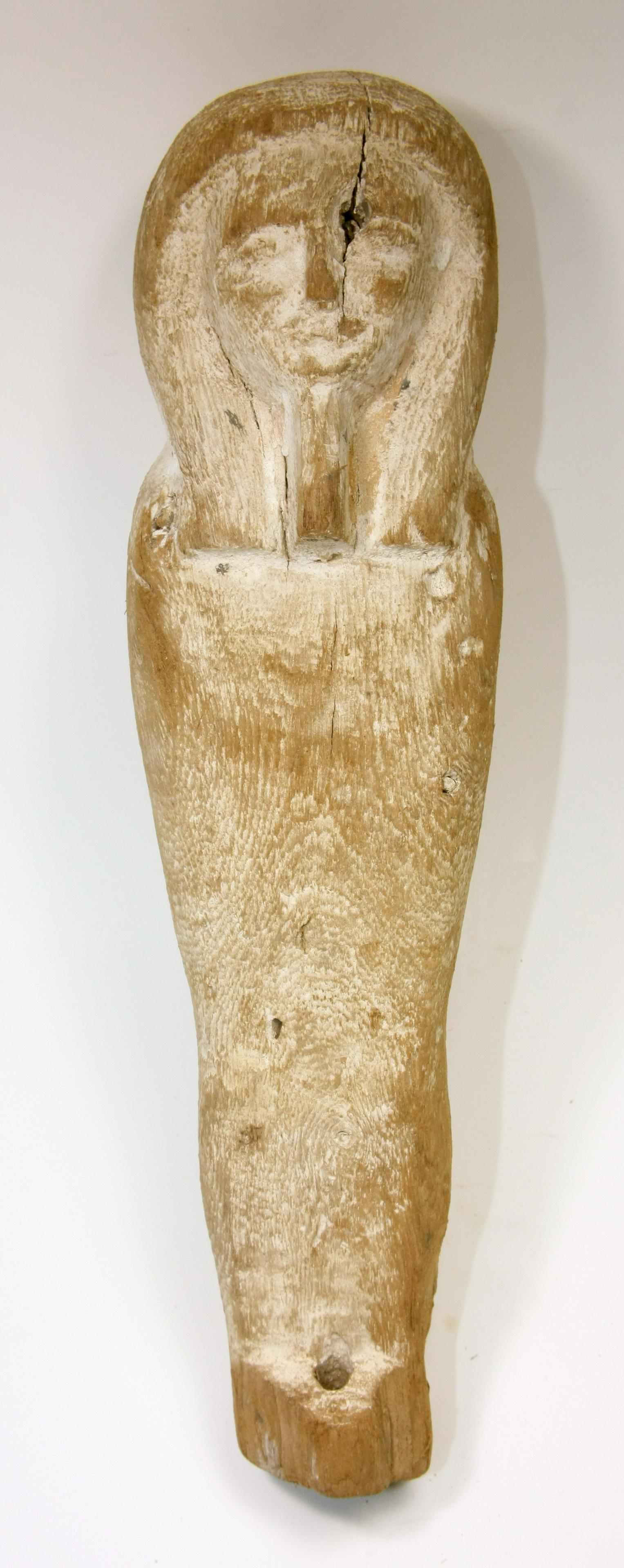 Ancient Egyptian Ptah Sokar Osiris Wood figure: Ancient Egyptian Ptah Sokar Osiris Wood figure c.664-332 BC. Size 12 3/4 inches high. (32.3 cm) Fine Egyptian wood figure of Ptah Sokar Osiris standing with remaining paint over gesso. The mummiform f