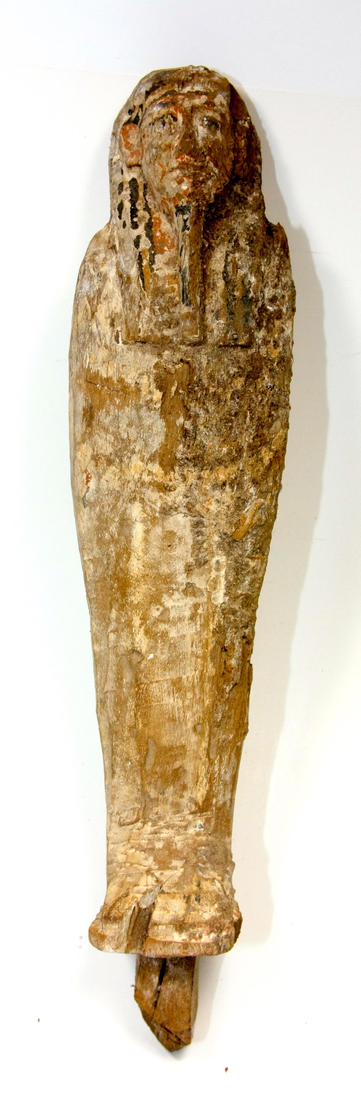 Ancient Egyptian Ptah Sokar Osiris Wood figure: Ancient Egyptian Ptah Sokar Osiris Wood figure c.664-332 BC. Size 11 1/2 inches high. (29.2 cm) Fine Egyptian wood figure of Ptah Sokar Osiris standing with remaining paint over gesso. The mummiform f