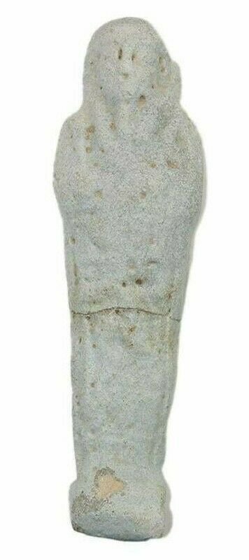 Ancient Egyptian Blue Faience Ushabti Figure c.664-332: Ancient Egyptian Blue Faience Ushabti Figure c.664-332 BC. Size 4 3/8 inches high. A blue glazed faience ushabti figure, wearing the royal wig and beard, holding implements and seed sack on back with 