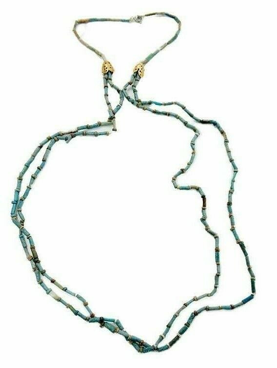 Ancient Egyptian Blue Faience Mummy Beads Necklace: Ancient Egyptian Blue Faience Mummy Beads Necklace c.664-30 BC. Size 30 1/2 inches length. Fine blue faience tubular and disk shape beads necklace. werable. Provenance: Ex Harlen Berk Chicago USA.