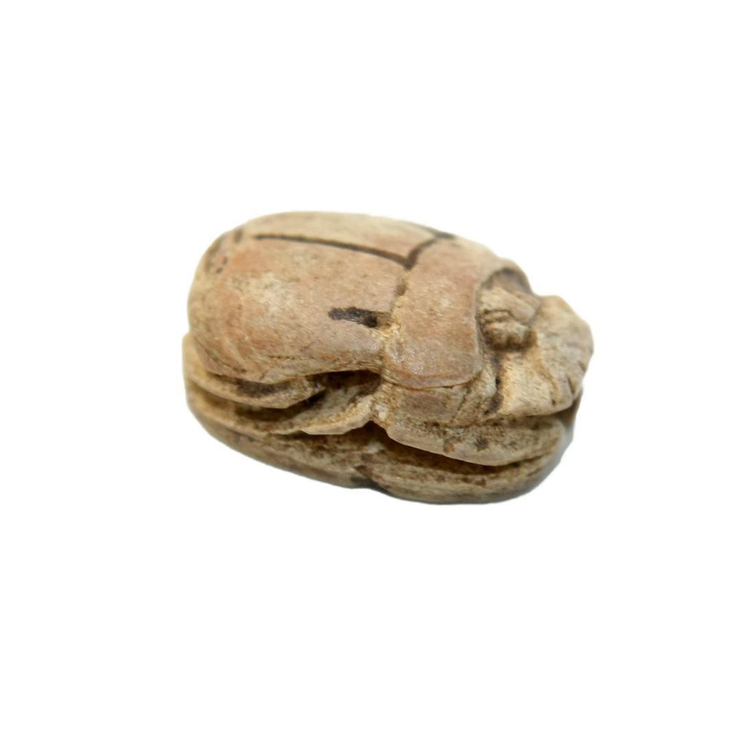 Ancient Egyptian Steatite Scarab second intermediate: Ancient Egyptian Steatite Scarab second intermediate period c. 1785-1070 BC. Size 11 x 8 mm. Fine Steatite stone scarab. The inscription contains The "NUB" sign for Gold "NEFER" Provenance: Ex Harlen 