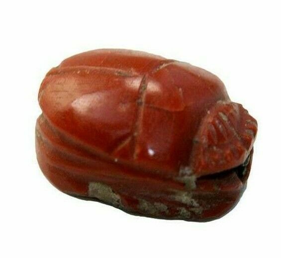 Ancient Egyptian Agate Stone Scarab Late period: Ancient Egyptian Agate Stone Scarab Late period c.715-330 BC. Size 14 x 10 mm. Fine Agate stone scarab. The reverse carved with standing figure god? Provenance: Ex Harlen Berk Chicago USA.